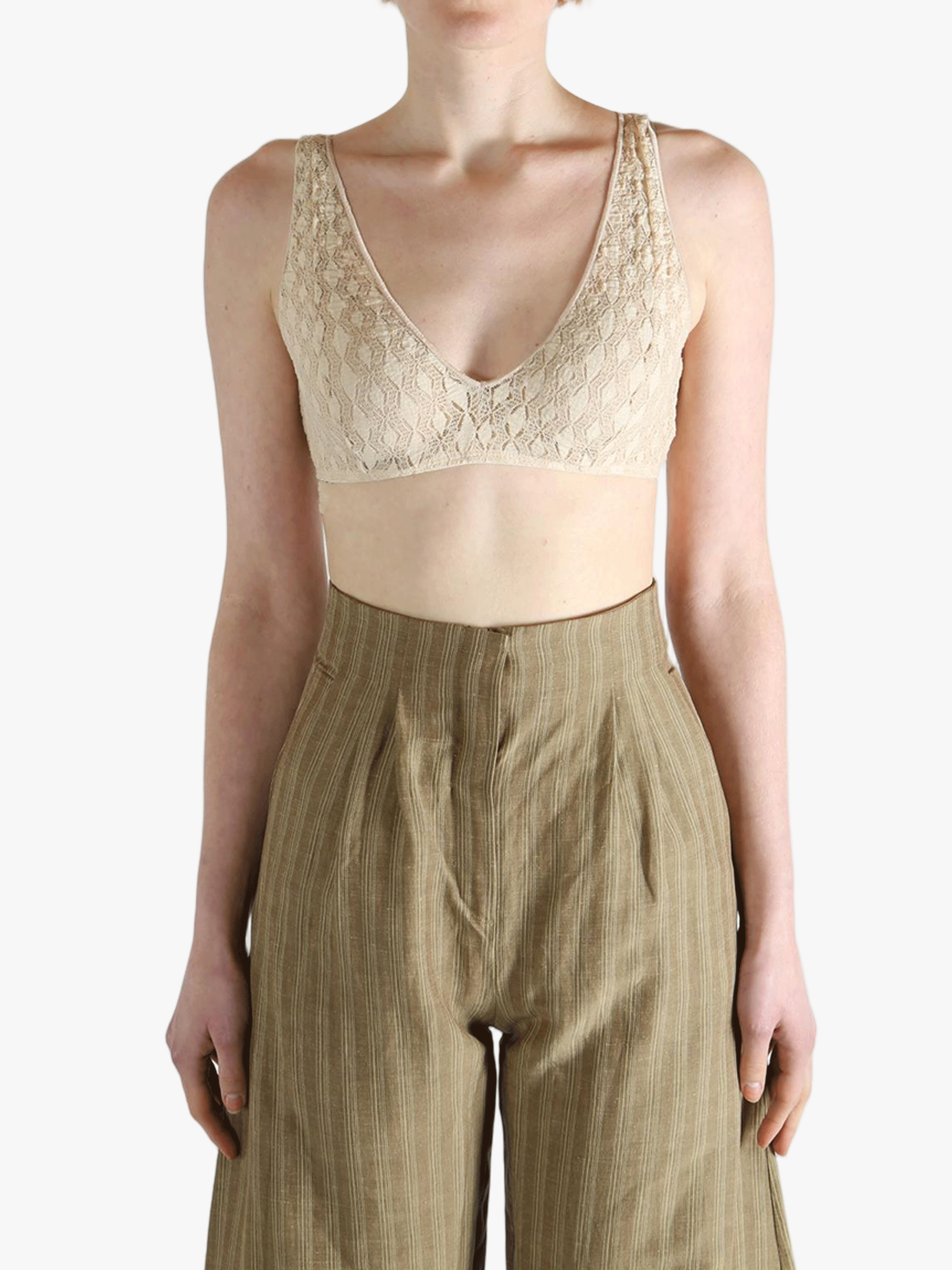 Tan bra worn by a person, showing the bra's fit