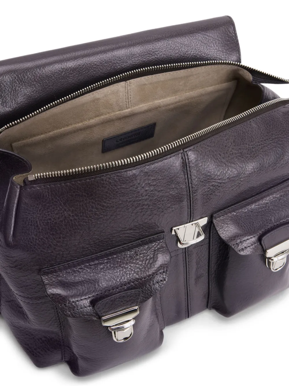 Close up of the purple bag, showing texture of the leather fabric