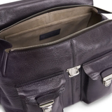 Close up of the purple bag, showing texture of the leather fabric