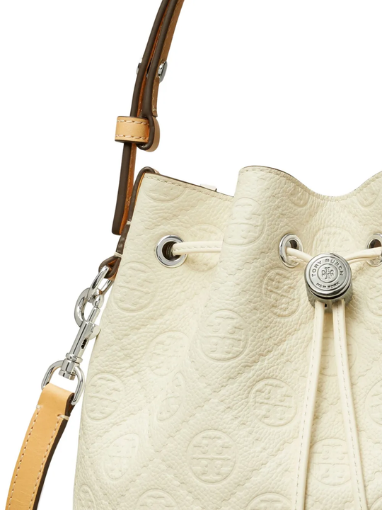 close up of white bags, showing texture of the leather fabric