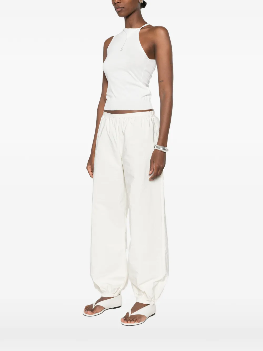 White top, full body view
