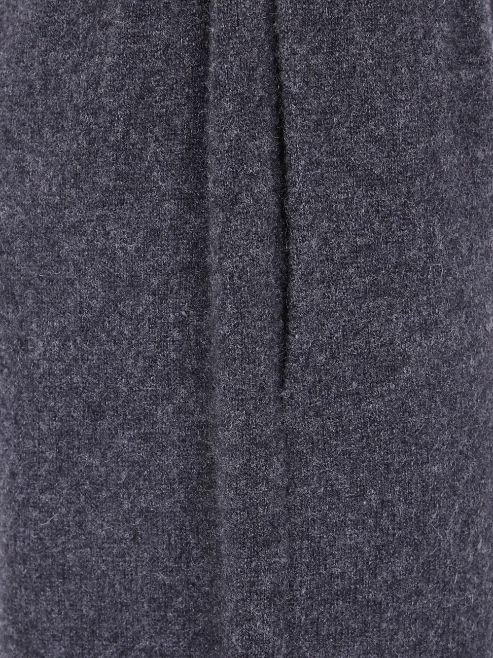 Close up of grey pants, showing texture of the fabric
