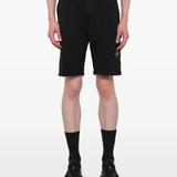 Black shorts warn a person,showing the shorts fit