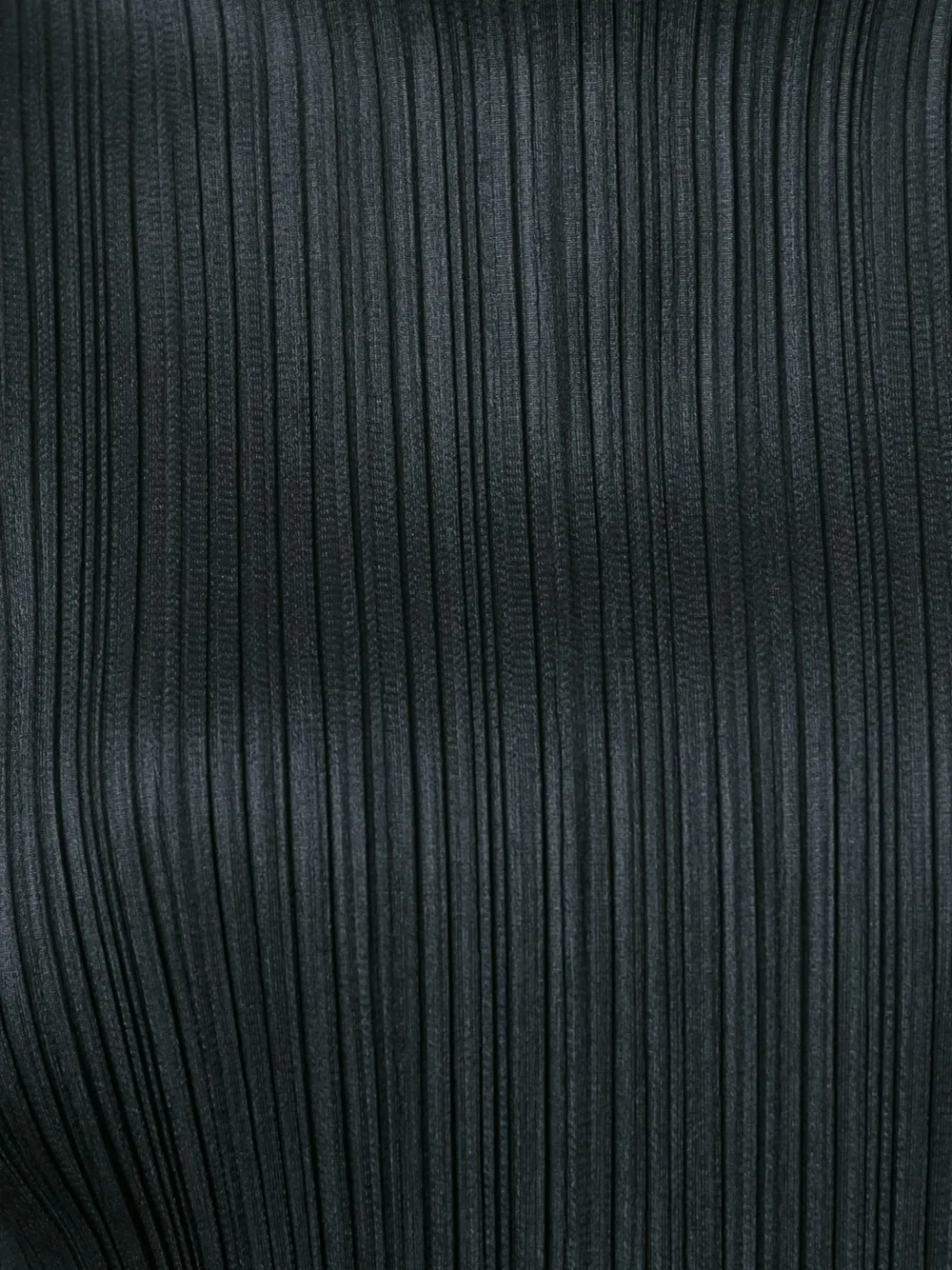 Close up of Black shirt, showing texture of the 100% polyester fabric