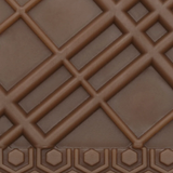 Close up of  tan sneakers, showing texture of the rubber fabric
