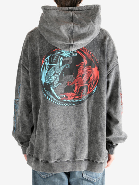 Black hoodie worn by a person, showing the hoodie's fit