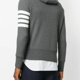 Grey hoodie worn by a person, showing the hoodie's fit