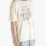 White t-shirt worn by a person, showing the shirt's fit