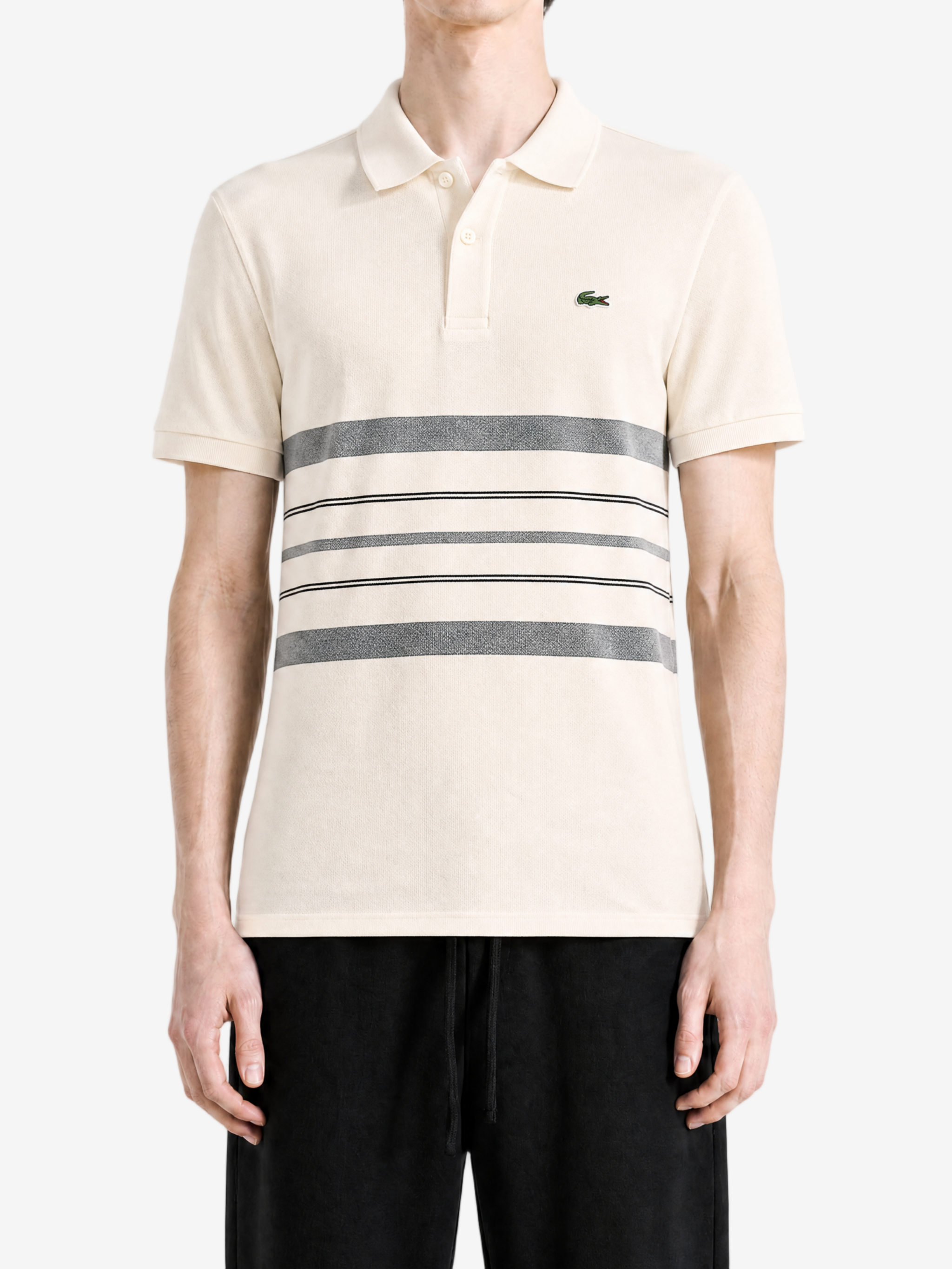 Tan shirt worn by a person, showing the shirt fit