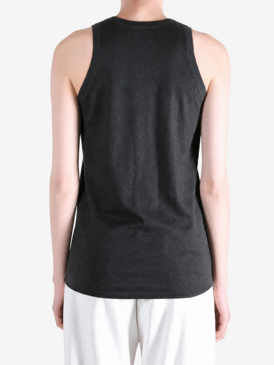 Black top worn by a person, showing the top fit