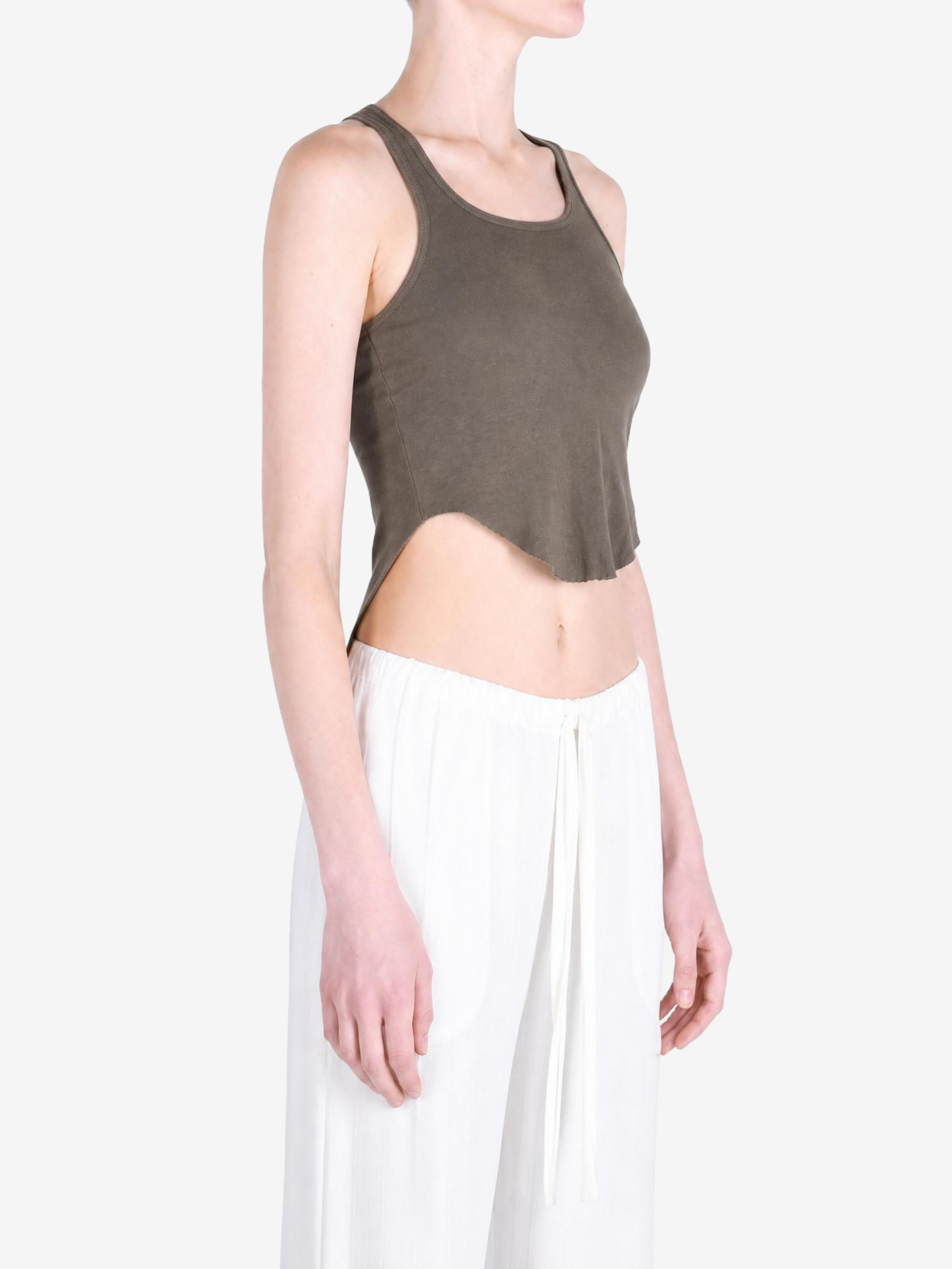 Brown top worn by a person, showing the top fit
