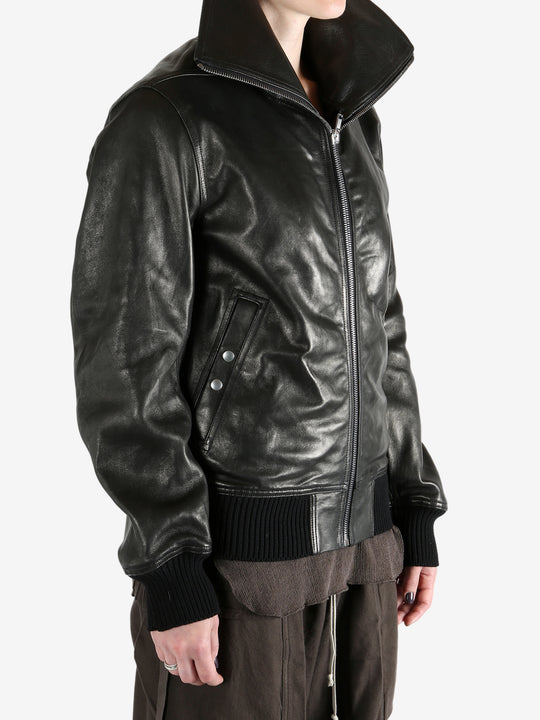 Black jacket worn by a person, showing the jacket's fit