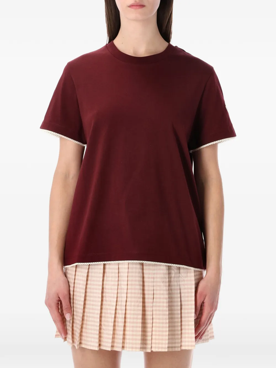 Red t-shirt  worn by a person, showing the t-shirt's fit