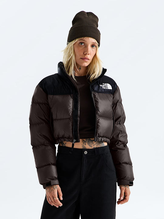 Brown jacket worn by a person, showing the jacket fit
