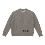 grey knitwear, back view