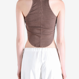 Brown top worn by a person, showing the top fit