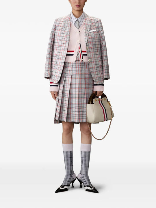 Pink knitwear, full body view