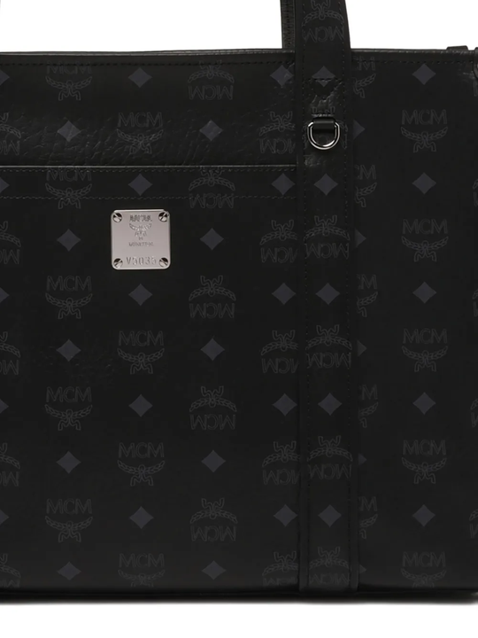 Close up of black bag, showing texture of the cotton fabric