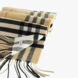 Close up of the tan scarf, showing texture of the cashmere fabric