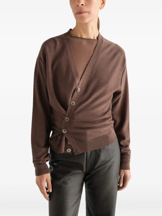 Brown knitwear worn by a person, showing the knitwear fit