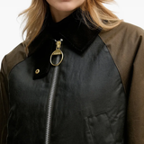 Brown jacket worn by a person, showing the jacket fit