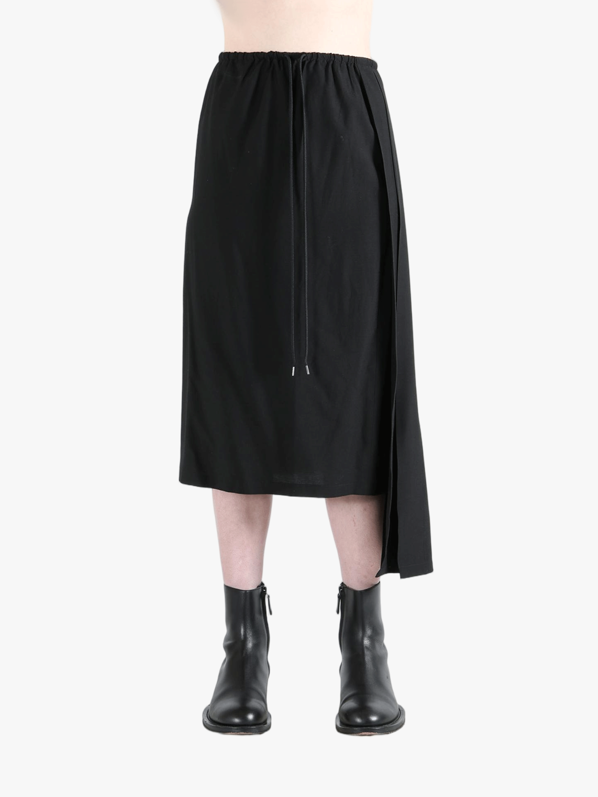 Black skirt worn by a person, showing the skirt fit