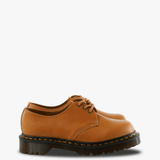 Tan shoes, side view