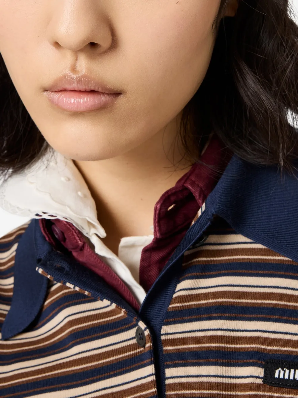 Close up of red shirt, showing texture of the Virgin Wool fabric