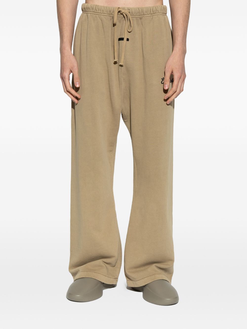 Tan pants worn by a person, showing the pants' fit