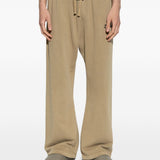 Tan pants worn by a person, showing the pants' fit