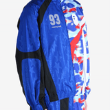 Blue jacket worn by a person,showing the jacket's fit