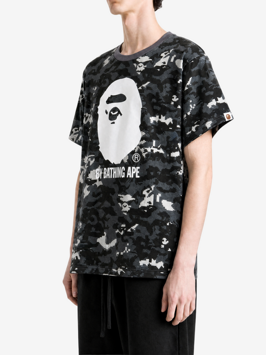 Black t-shirt worn by a person, showing the t-shirt fit