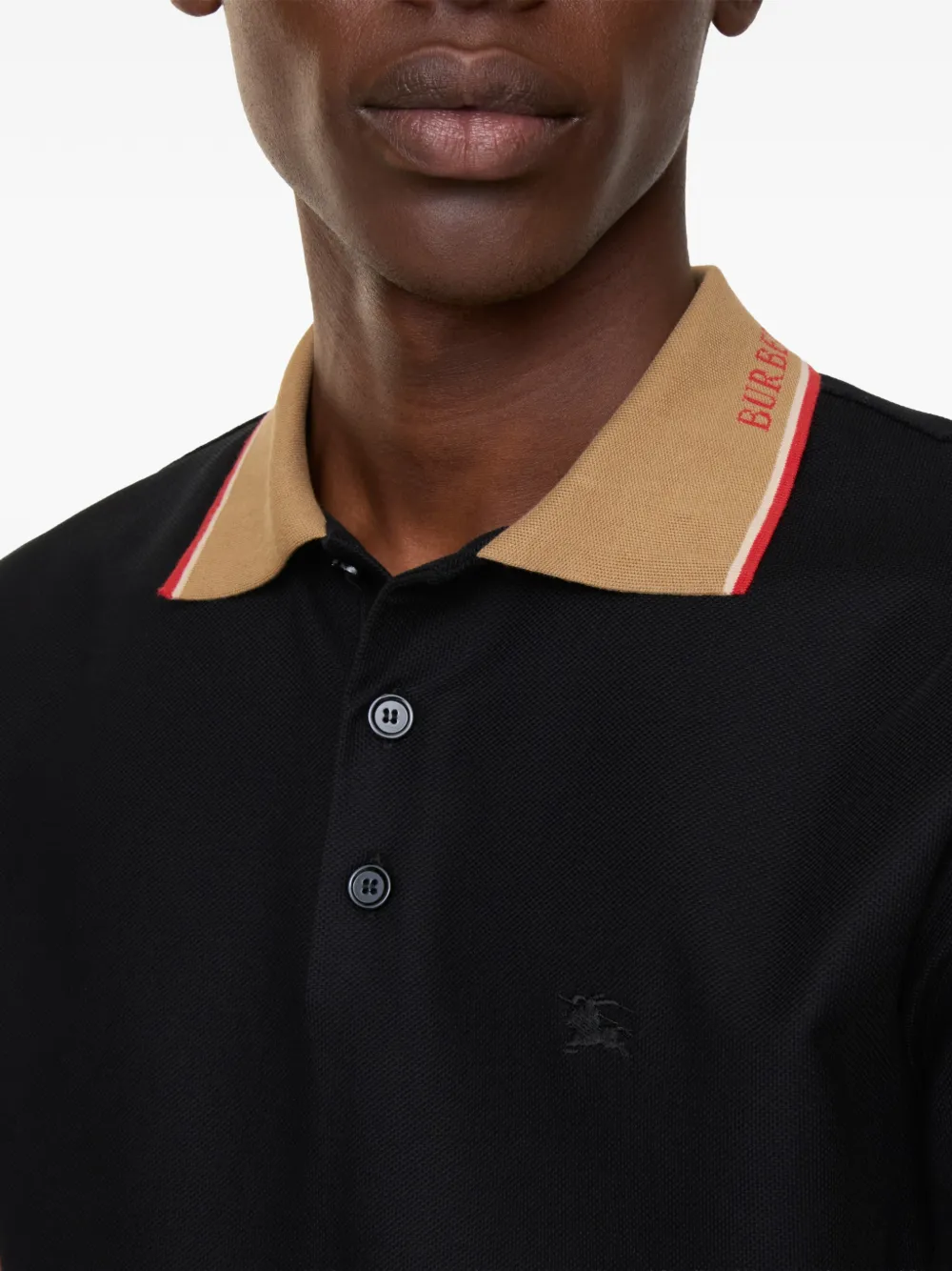 Close up of Black T-shirt, showing texture of the cotton fabric