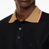 Close up of Black T-shirt, showing texture of the cotton fabric