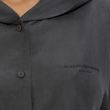 Close up of grey hoodie, showing texture of the Silk fabric