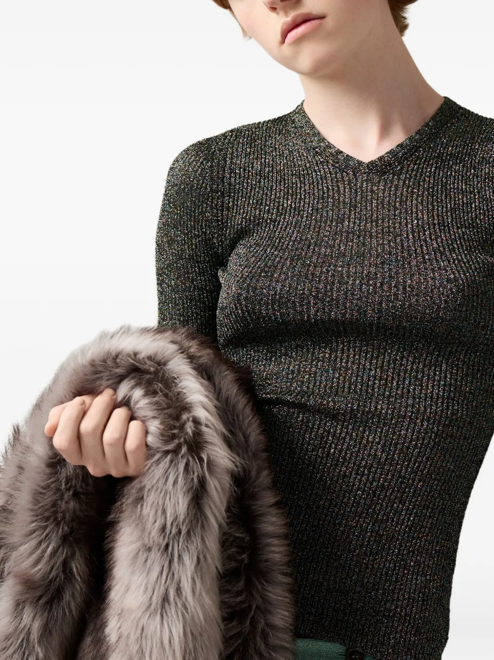 Unknown knitwear worn by a person, showing the knitwear fit