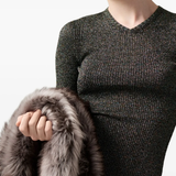 Unknown knitwear worn by a person, showing the knitwear fit