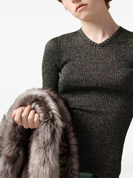 Unknown knitwear worn by a person, showing the knitwear fit