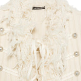 Close up of White top, showing texture of the 90% wool/ 10% polyamide fabric