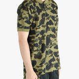 Green shirt worn by a person, showing the shit fit