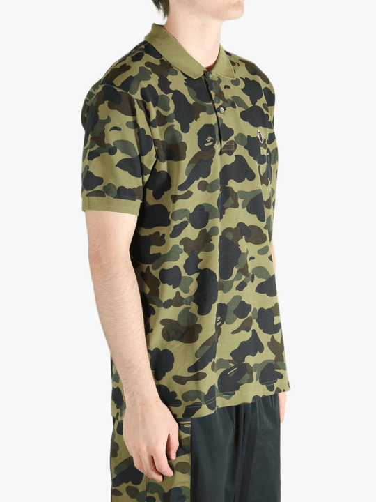Green shirt worn by a person, showing the shit fit