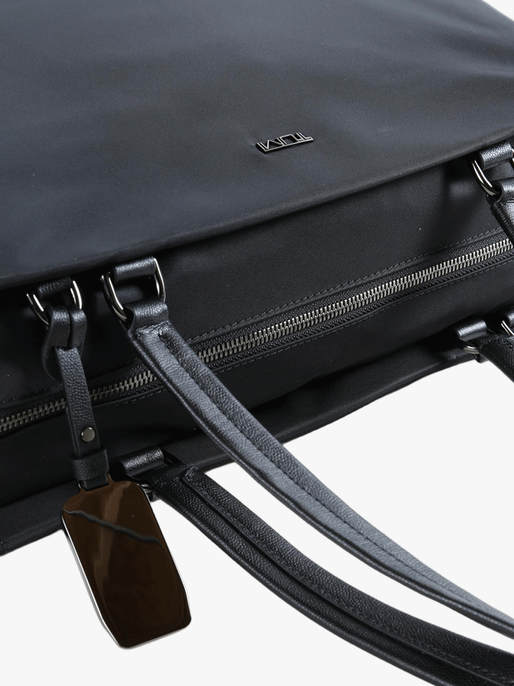 Close up of black bag, showing texture of the nylon fabric