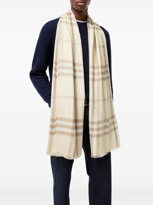 Tan scarf worn by a person, showing the scarf fit