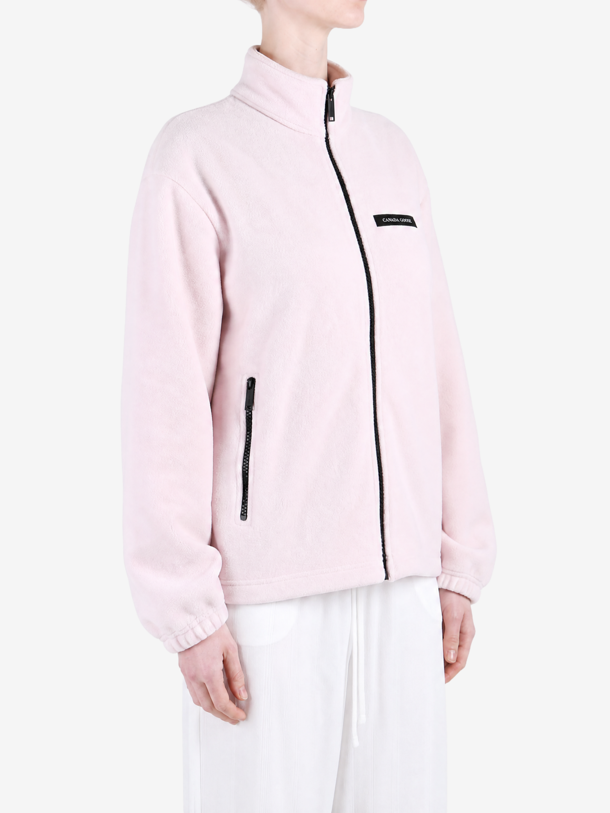 Pink jacket worn by a person, showing the jacket fit