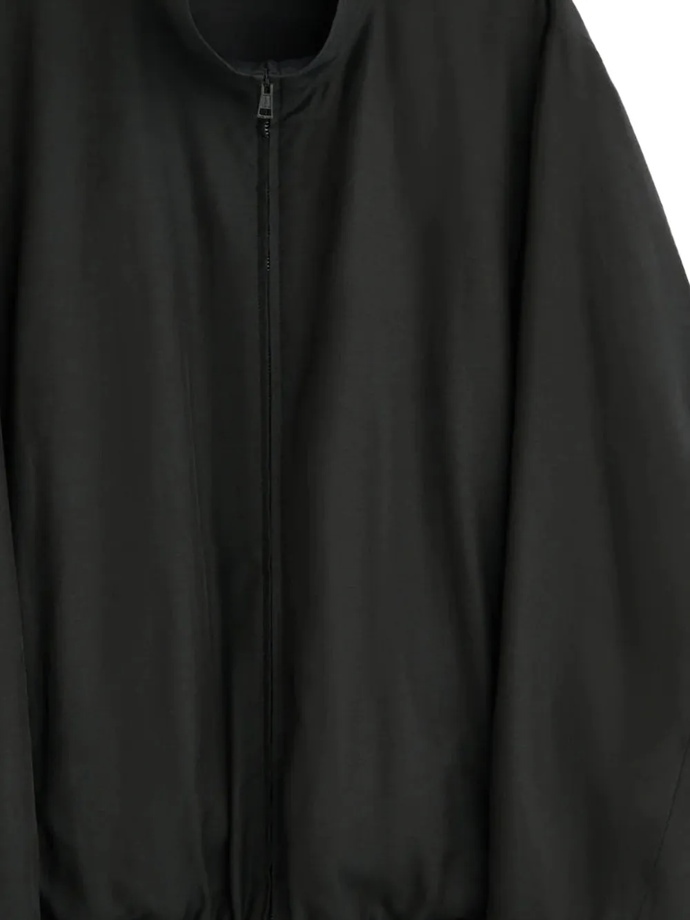 Close up of black jacket , showing texture of the Cupro and Cotton fabric