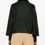 Black jacket worn by a person, showing the jacket's fit