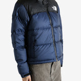 Navy jacket worn by a person, showing the jacket fit