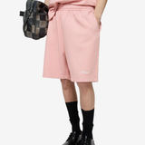 Pink shorts, full body view