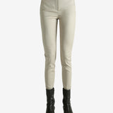 Tan pants worn by a person, showing the pants fit