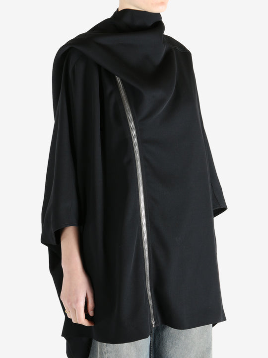 Black jackets worn by a person, showing the jackets fit